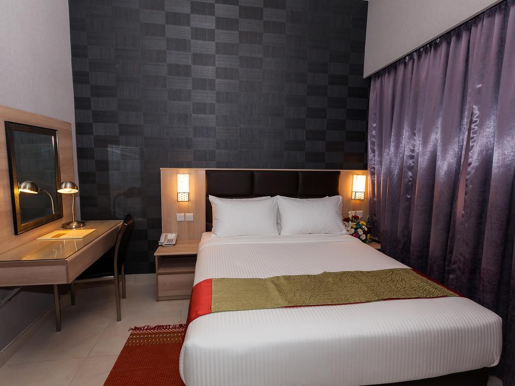 Florida Square Hotel Dubai Rum bild