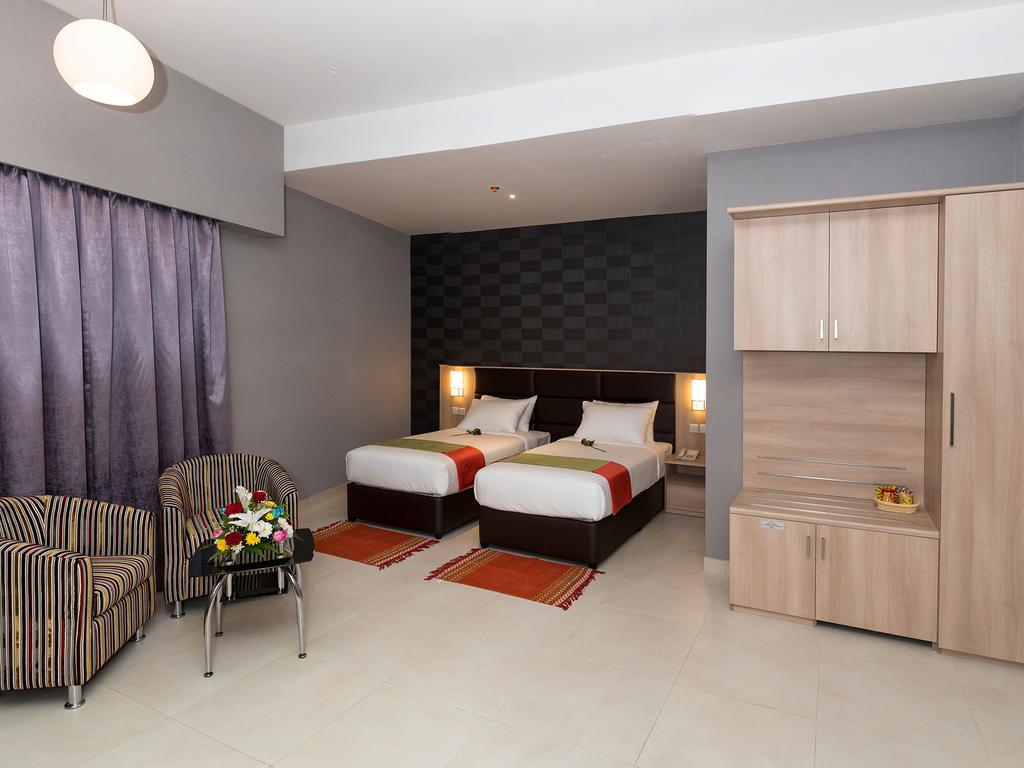 Florida Square Hotel Dubai Rum bild
